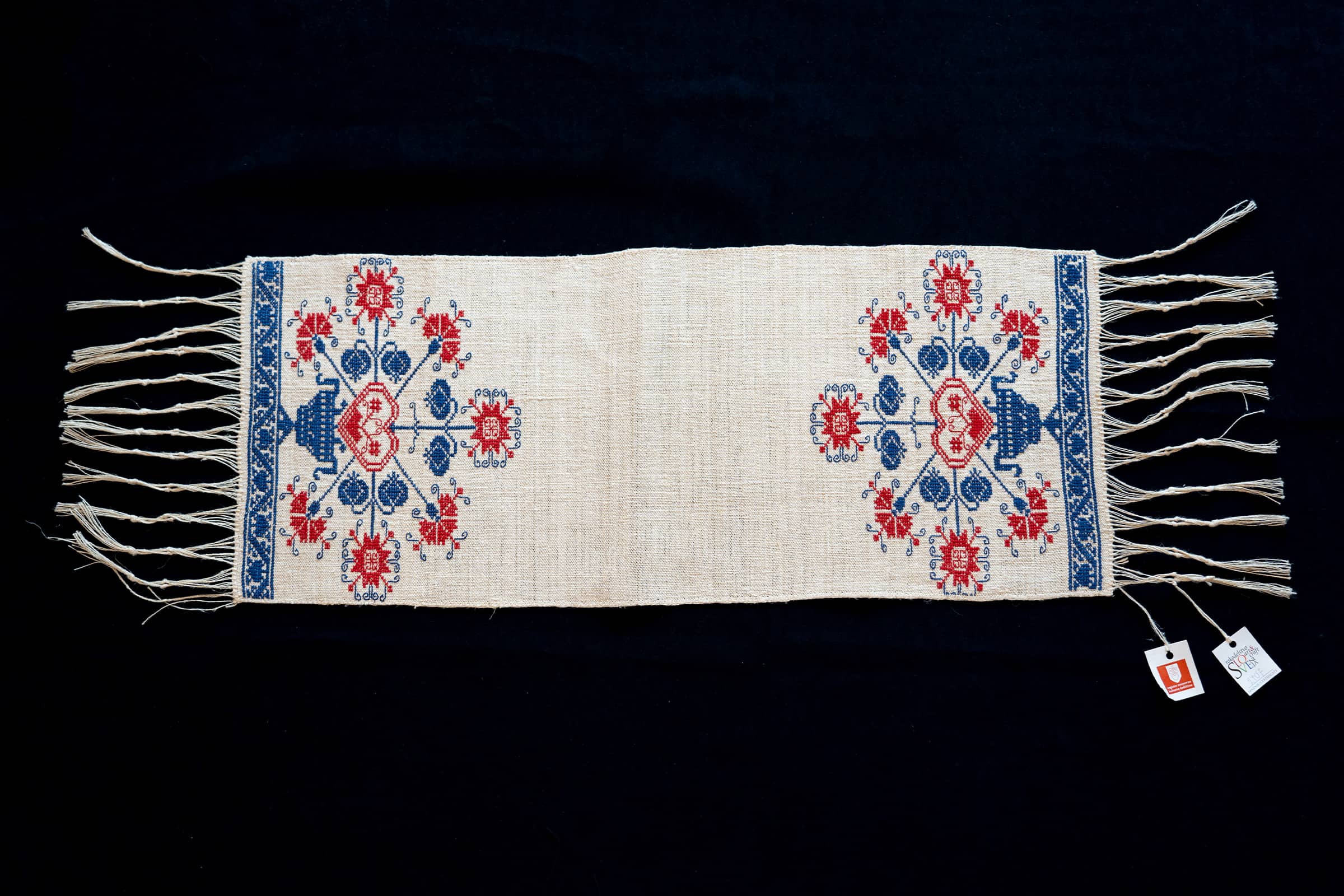 Traditional slovak linen towel (slo. otirač or otirača), finely embroidered with motifs from the Gorenjska (Upper Carniola) region.